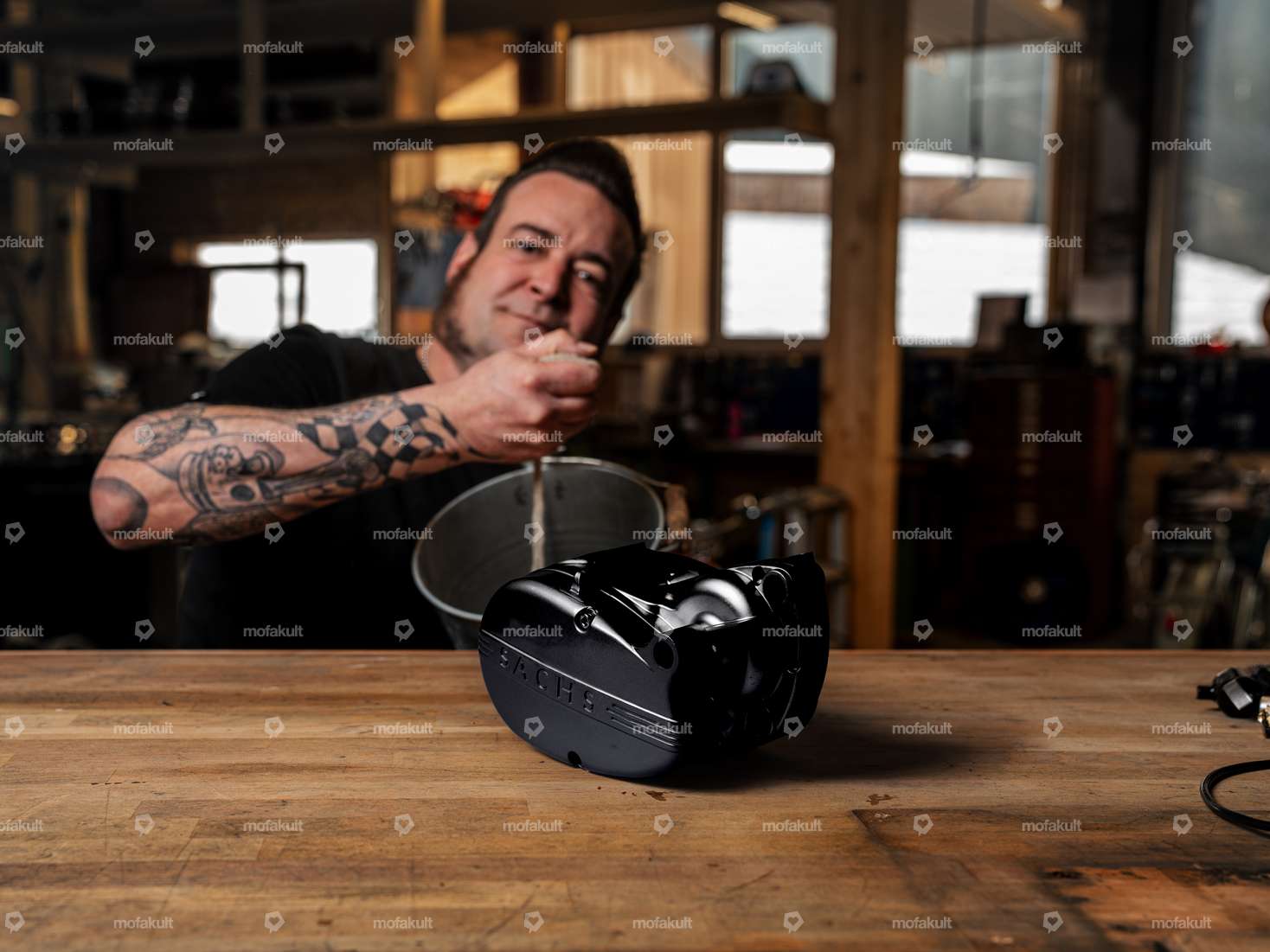 Siggnature motor housing sandblasting & stove enameling black Carousel Image 1